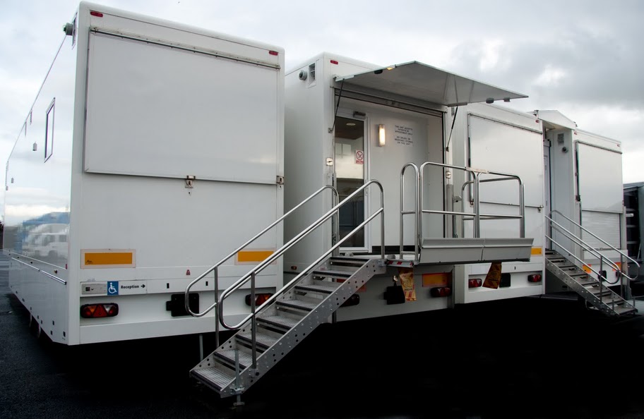 Medical trailers and mobile medical vehicles